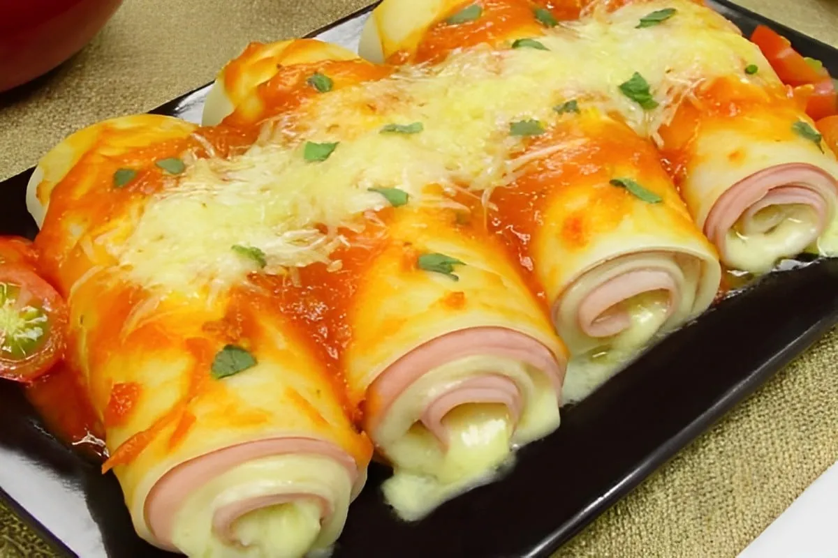 Canelone de presunto e queijo feito com massa de pastel prát