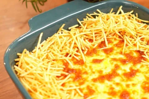 Frango com creme de milho gratinado que fica suculento e che