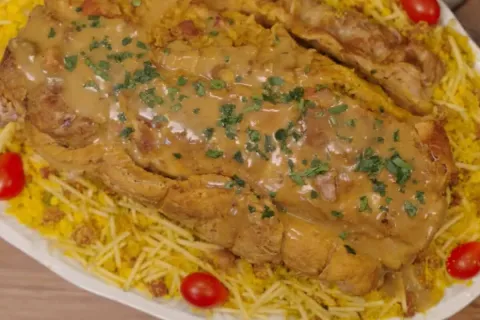 Lombo recheado com farofa de batata palha: suculento e cheio