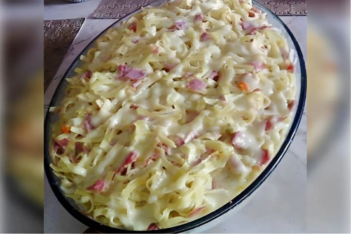 Macarronada especial com molho branco presunto e ervilhas ma