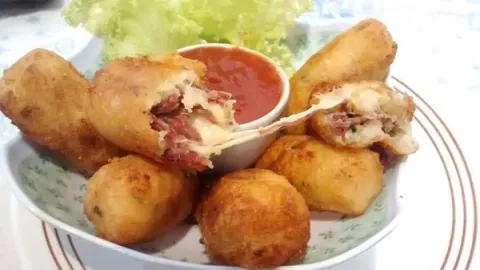 Mandioca Recheada Frita